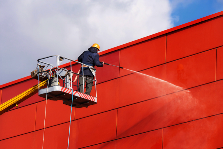 Worker,Of,Professional,Facade,Cleaning,Services,Washing,The,Red,Wall.